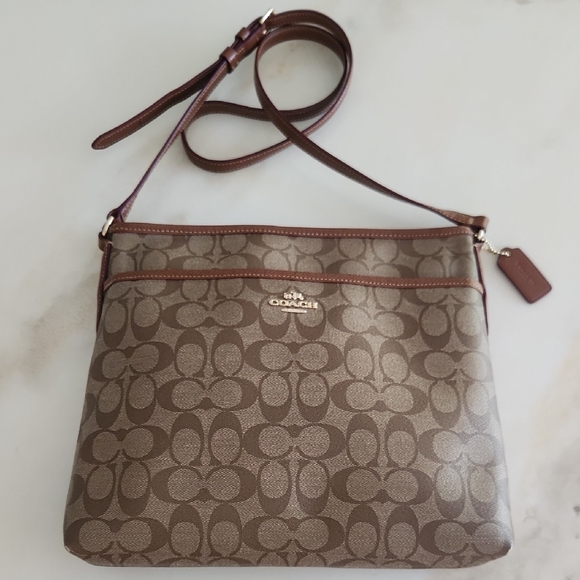 Coach Handbags - Coach Signature Tan Crossbody Bag